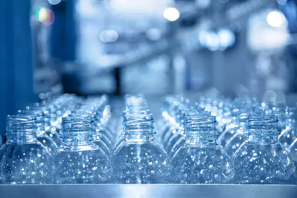 Energy efficient cooling system in PET bottle blowing industry with air compressor